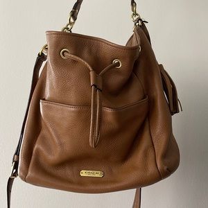 Medium brown leather Coach purse